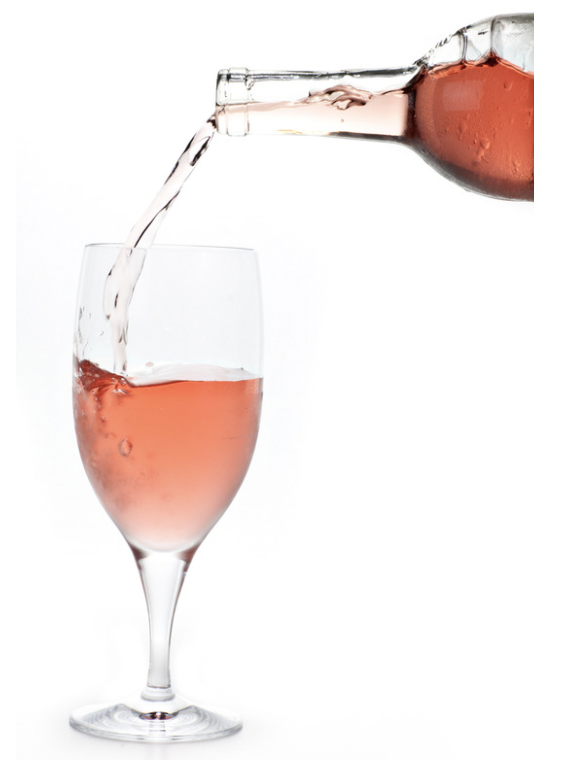 pouring a glass of white zinfandel